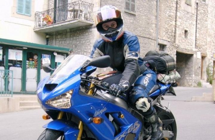 Elena touring blue motorbike